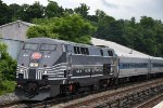 Outbound commuter approaches the station behind the New York Central heritage unit